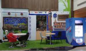 Area UMKM Corner AirNav Indonesia dengan vending machine digital dan ruang display produk UMKM modern di area publik indoor.